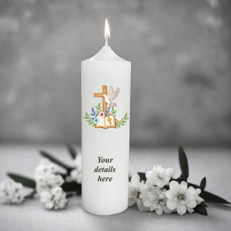 White baptism candle with a cross and floral design.