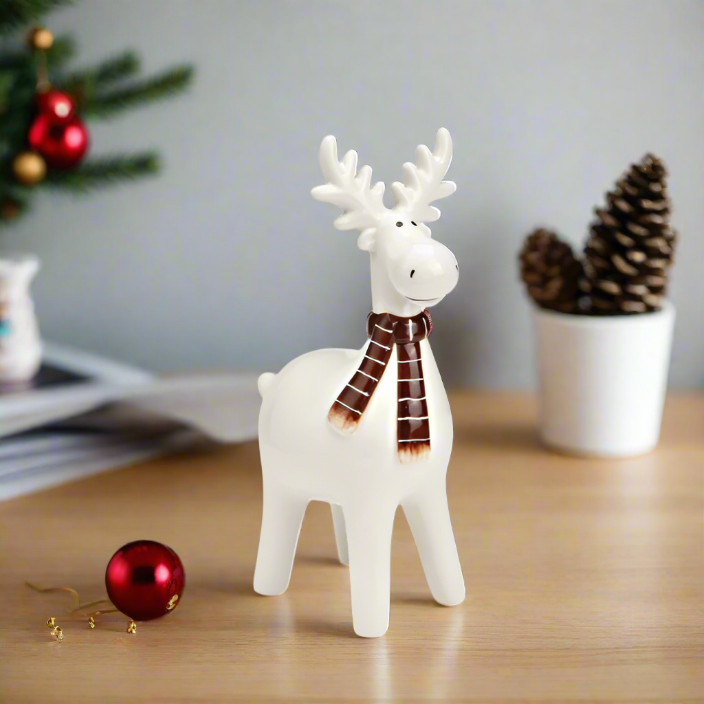 White ceramic moose with scarf