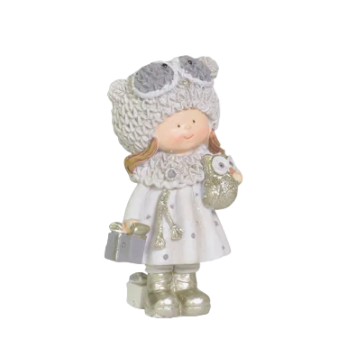 Decorative figurine of a child in winter clothing on a white background