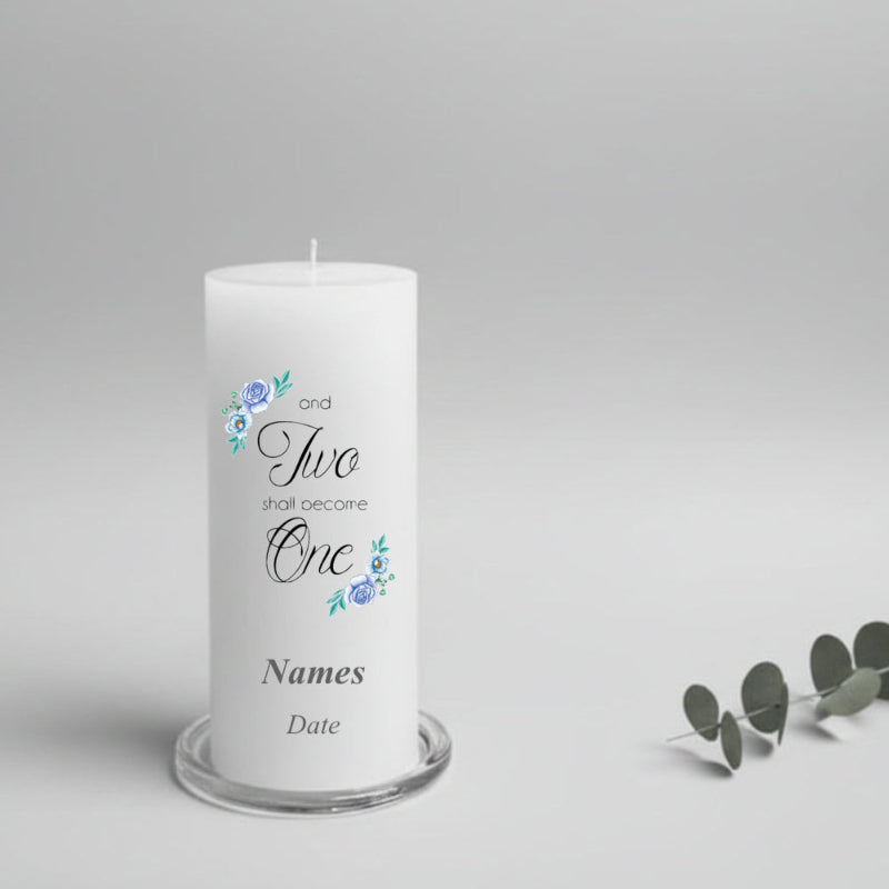 White wedding candle with text and floral designs on a gray background