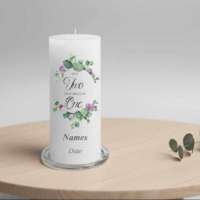 White wedding candle with floral design and text