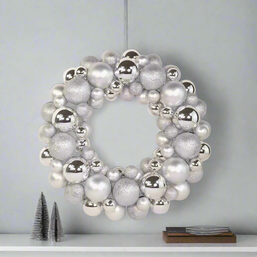 Decorative wreath made of silver and grey spherical ornaments