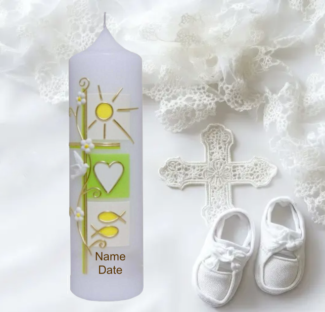 Candle with religious symbols, white shoes, and cross on a white lace background