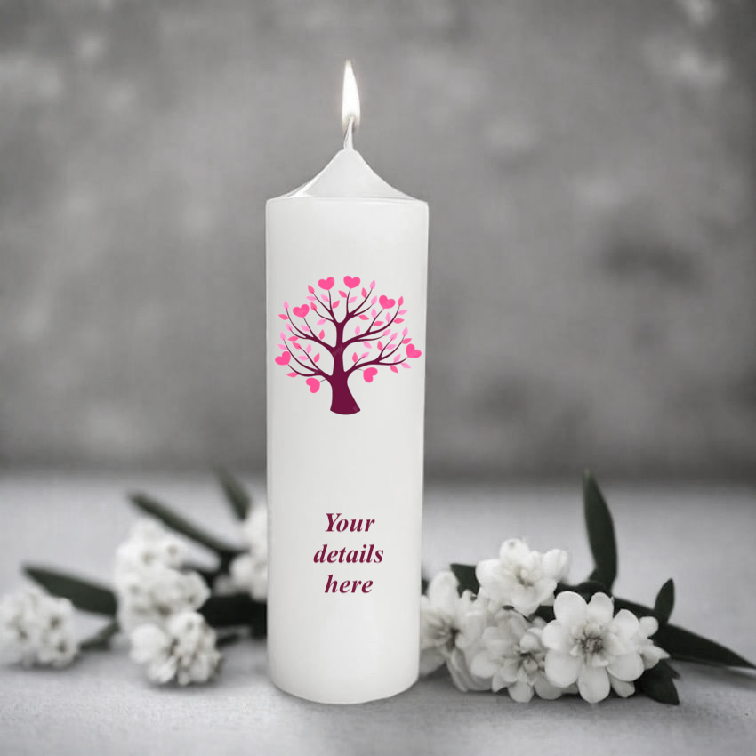 White candle with a pink tree design and 'Your details here' text, surrounded by white flowers on a gray background.