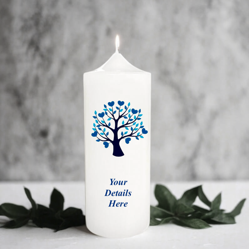 White candle with blue tree design and 'Your Details Here' text on a grey background
