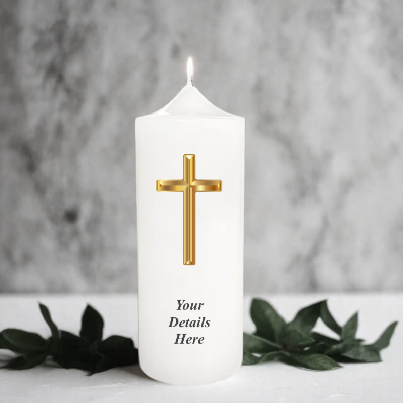 White candle with a gold cross on a gray background