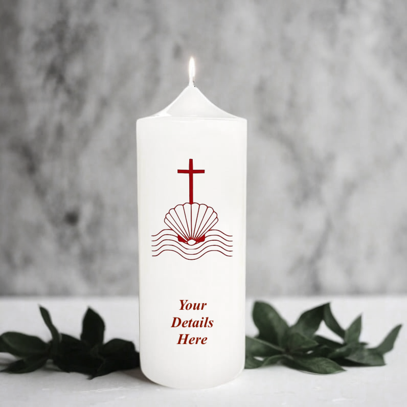 White candle with red design and text placeholder on a gray background