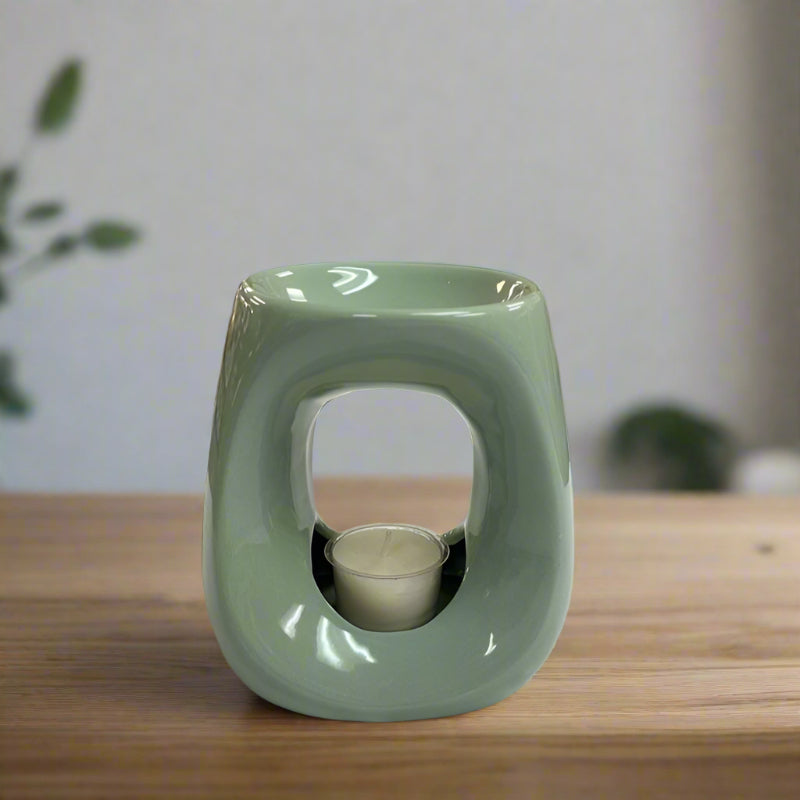 Fragrance-Burner-green-on wooden table