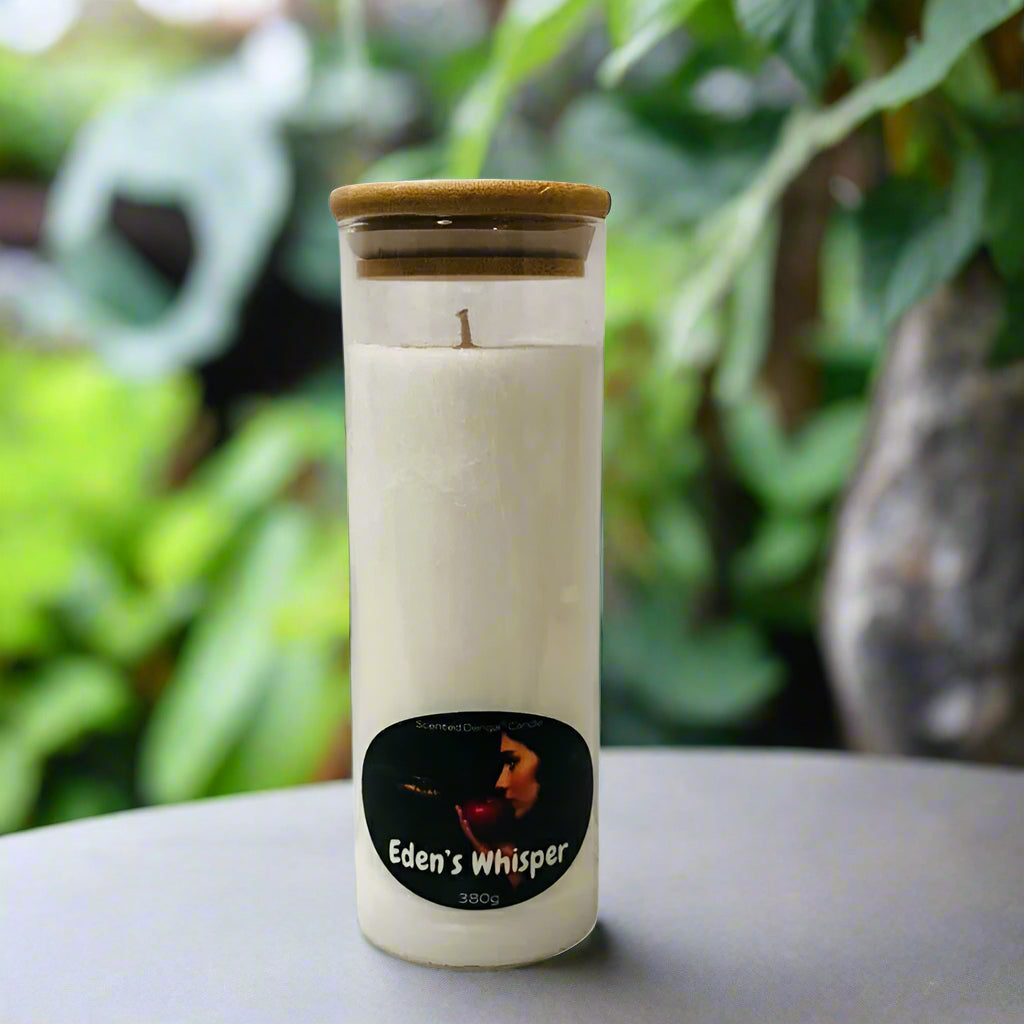 Candle in a glass jar with a bamboo lid, featuring 'Eden's Whisper' branding.