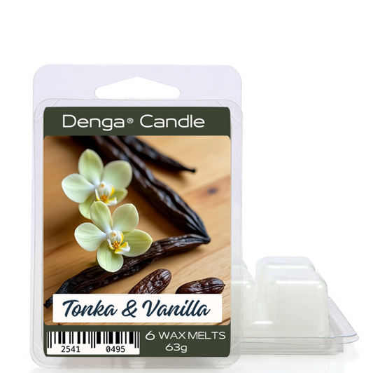 Denga Candle Tonka & Vanilla wax melts in a clear clamshell package with a printed label showing vanilla beans and orchid flowers, plus a small clear plastic wax melt tray beside it on a white background.
