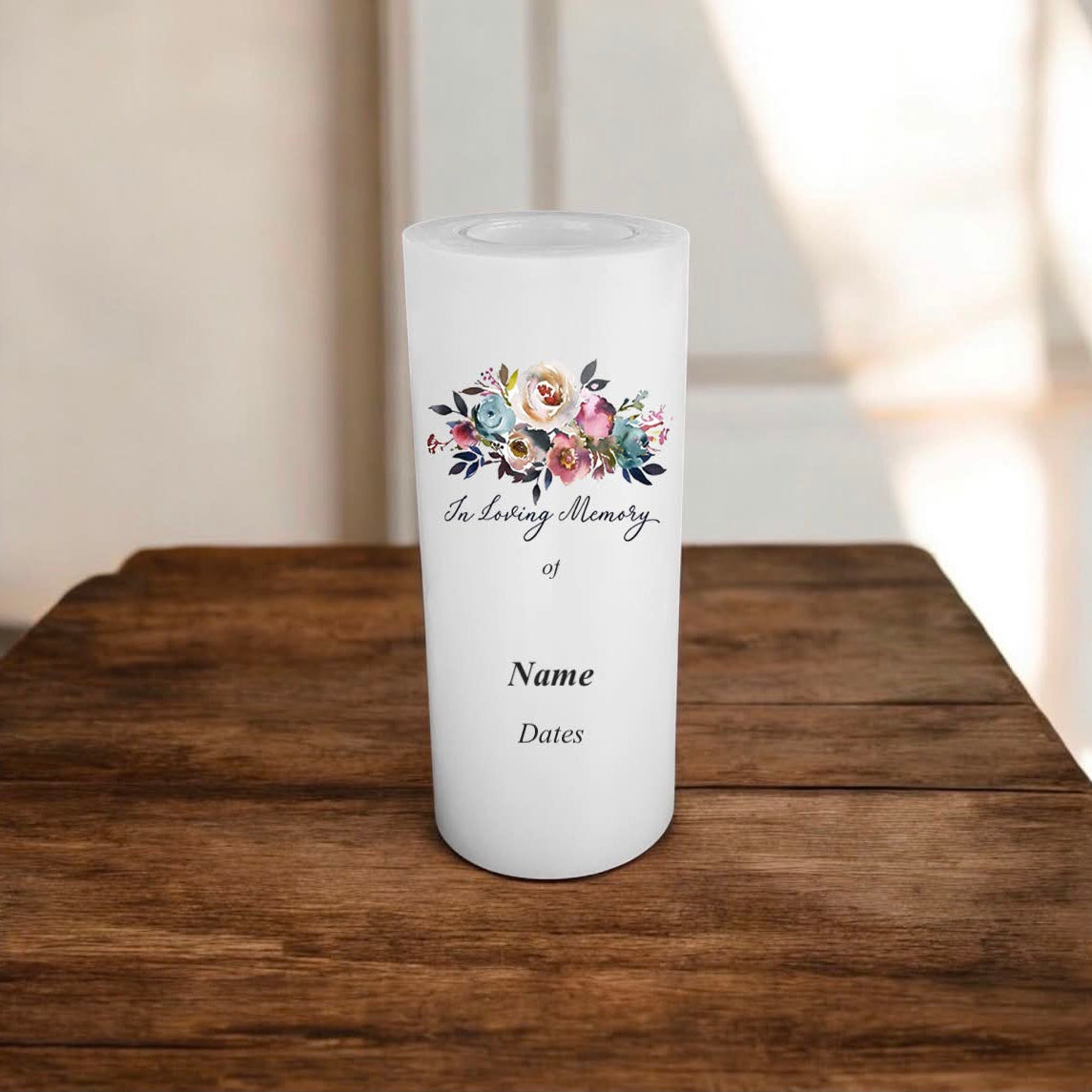 candle with text and flowers print on a wooden table