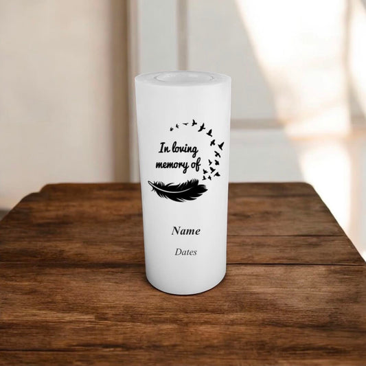 white memorial candle with black text