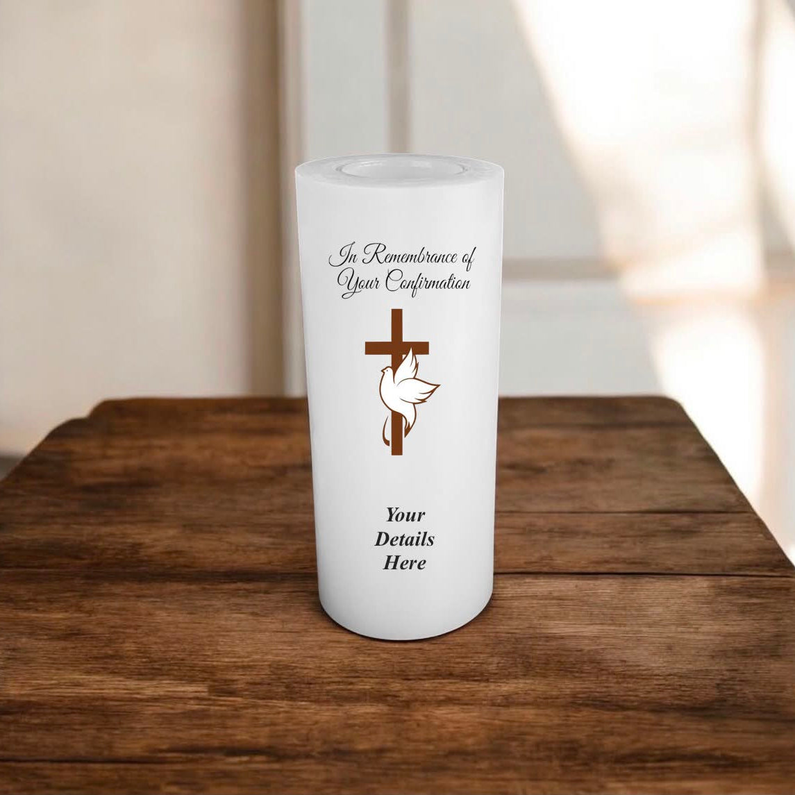 Personalized candle with religious design on a wooden surface