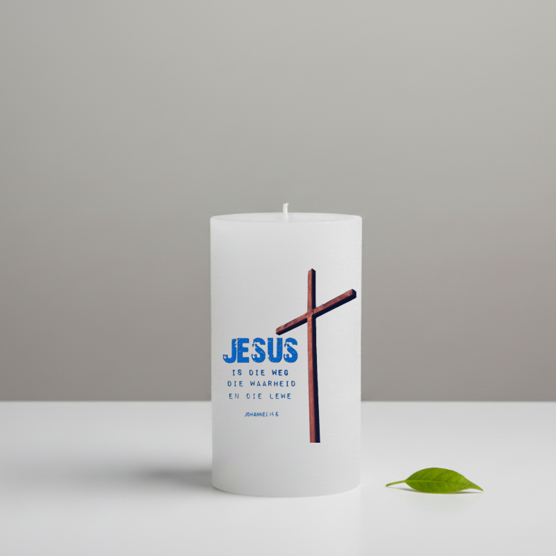 White candle with a cross and text on a gray background