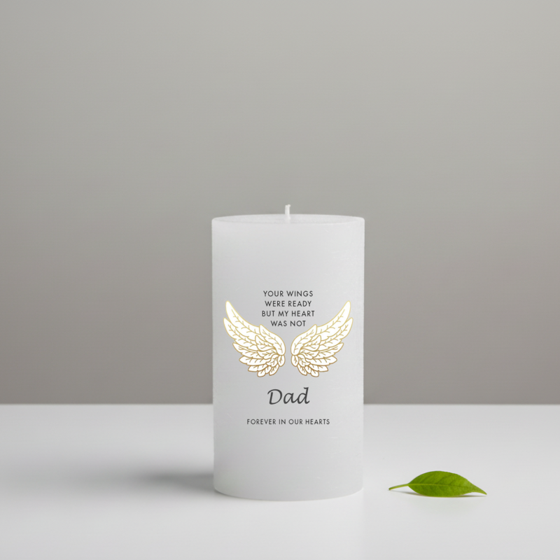 white candle with a text about Dad and wings, on a neutral background