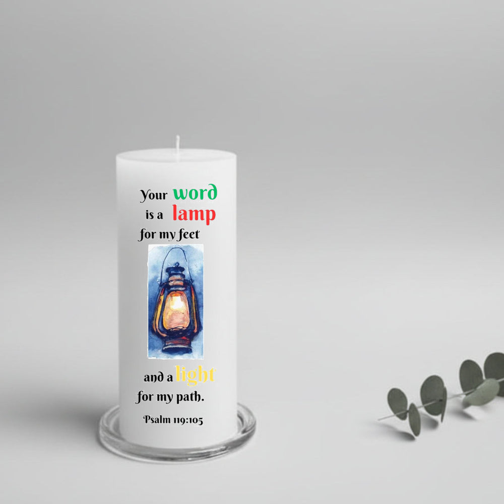 White candle with religious text and illustration on a grey background