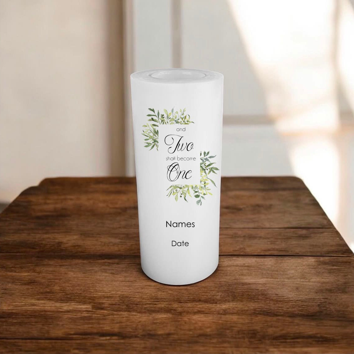A white candle with greenery design and a text inside, customisable candle