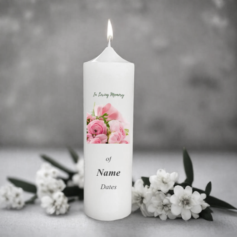 White memory candle with floral design and text.