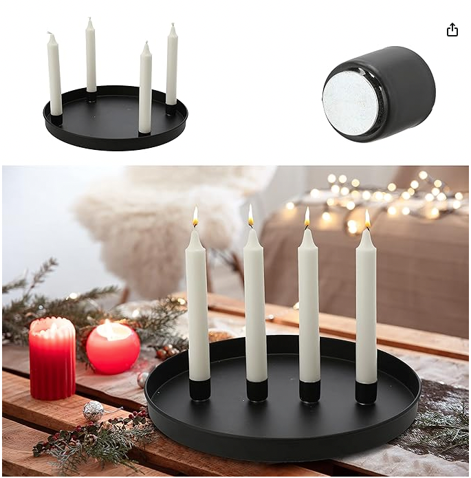 Round Black decorative Plate Ø 30cm with 4 Magnetic Bar Candle Holders and candles on a decorative table with red candles and lights.
