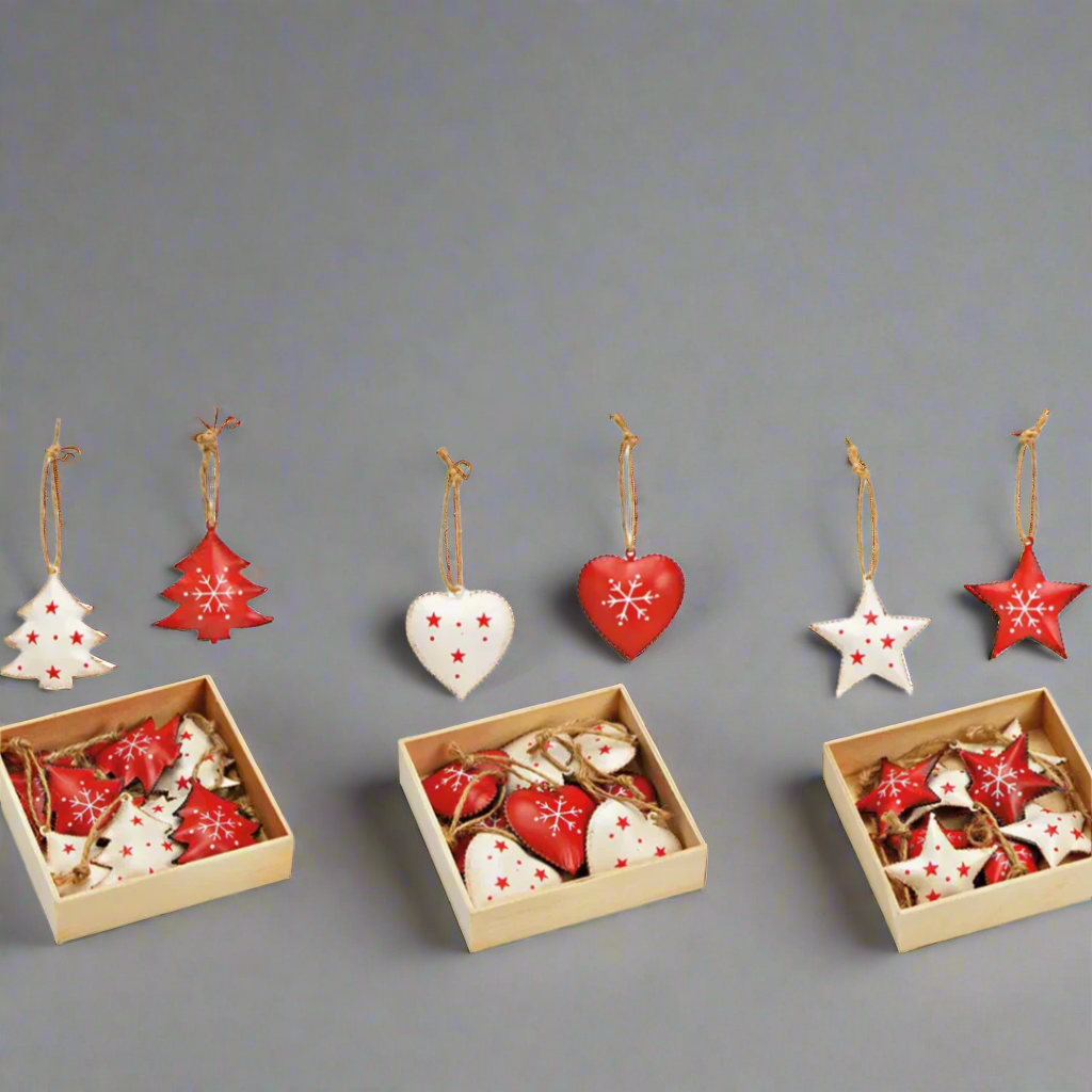 Set of Christmas tree ornaments in wooden gift boxes on a grey background