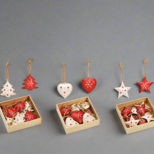 Set of Christmas tree ornaments in wooden gift boxes on a grey background