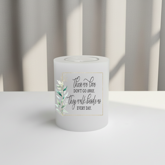 Everlasting Candle with a motivational quote on a white surface