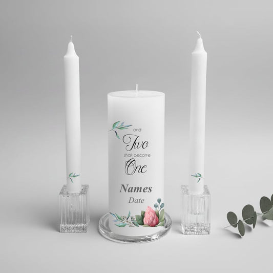 Wedding unity candle set with floral design and text on a gray background