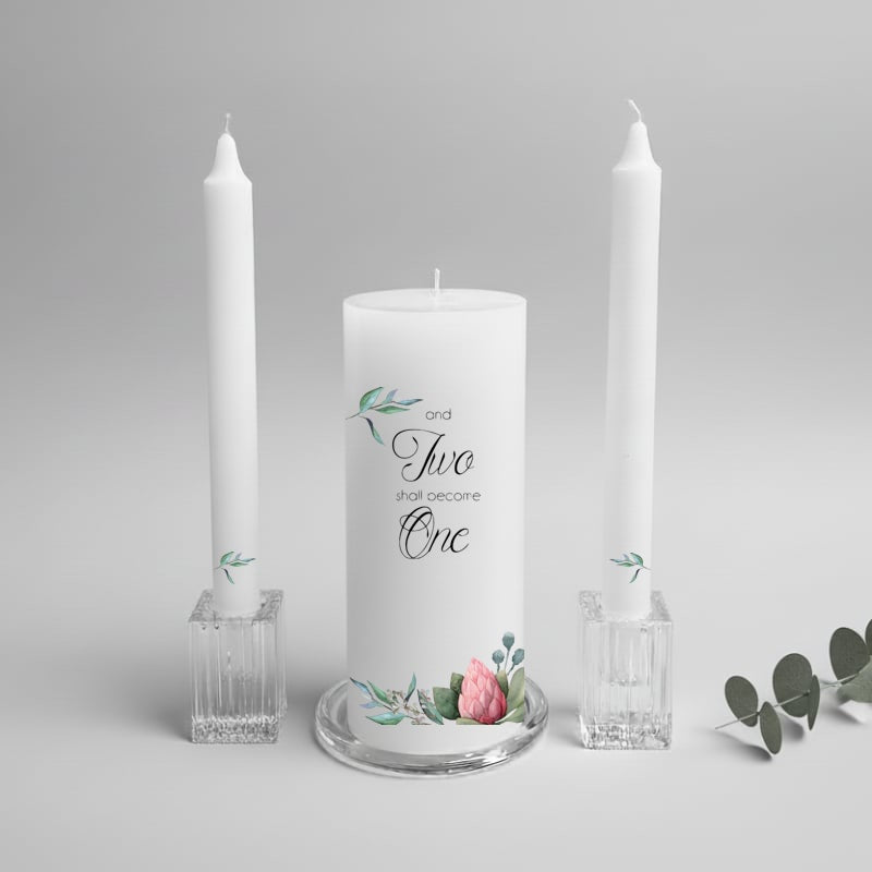 Wedding unity candle set with floral design and text on a gray background