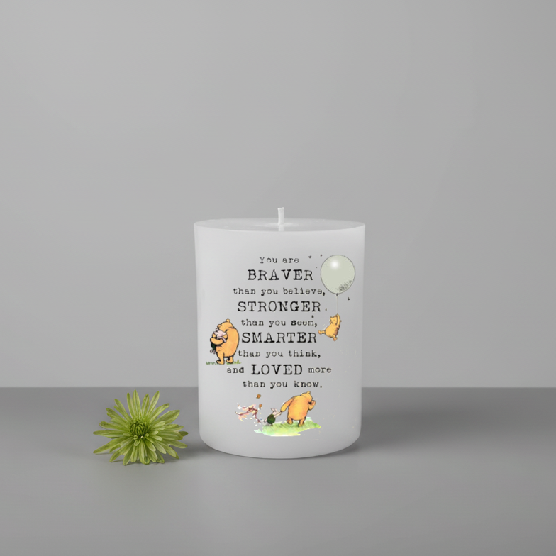 Candle with text on a grey background