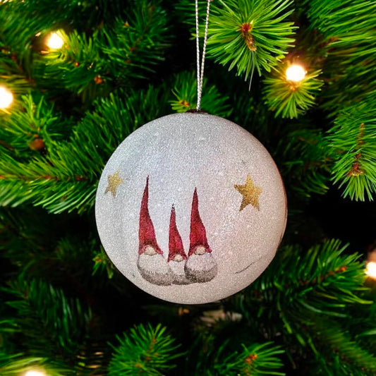 Christmas ball hanger hanging on a tree branch