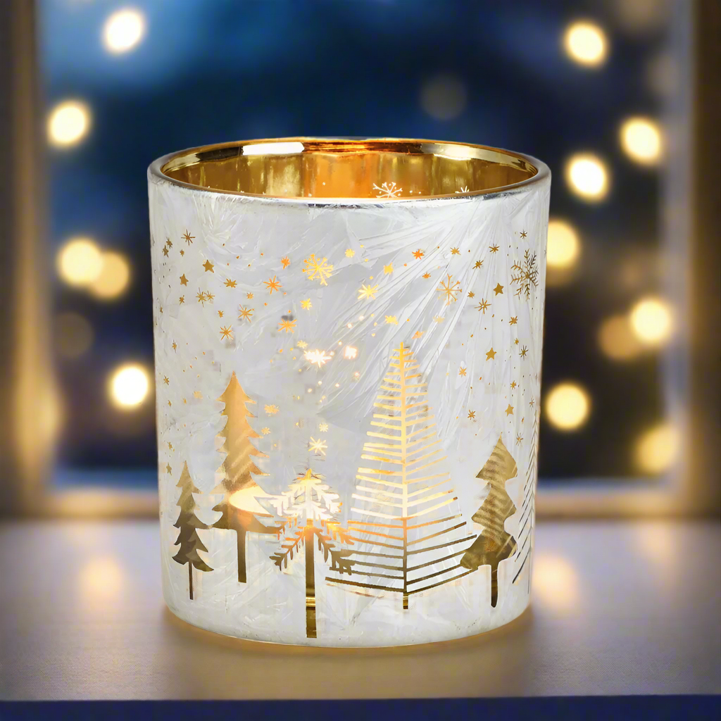 Decorative candle holder gold and white glass with trees and star designs 