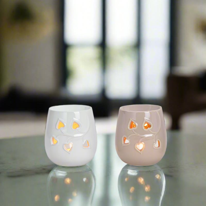 two ceramic fragrance burner with heart shaped patterns