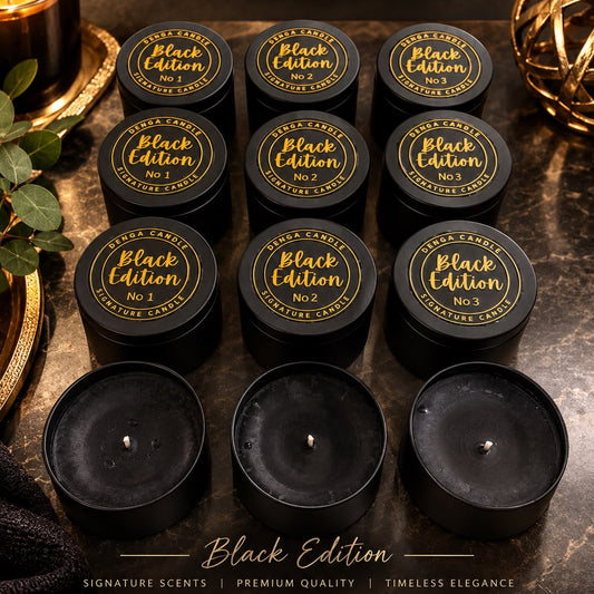 Signature candles in a black tin