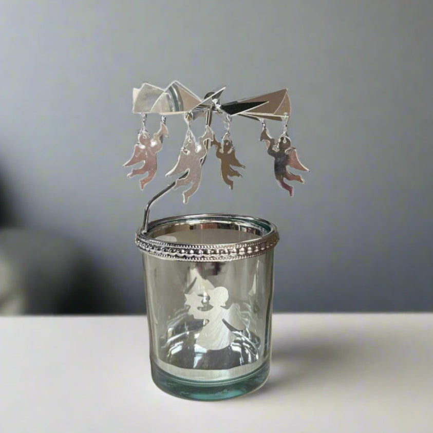 Decorative glass candle holder with metal figurines 