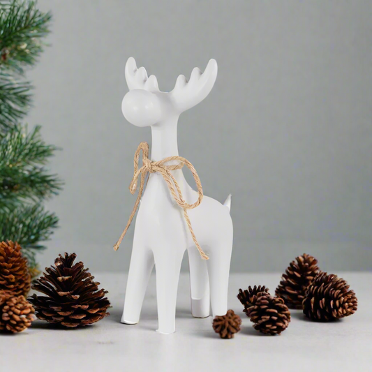 lightgrey deer figurine with a brown rope 