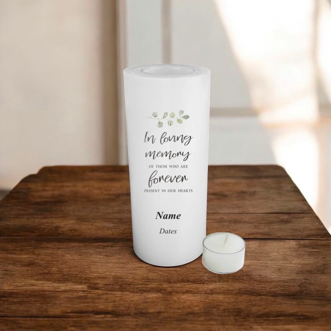 white candle with text on a wooden surface