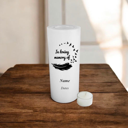 white memorial candle with black text