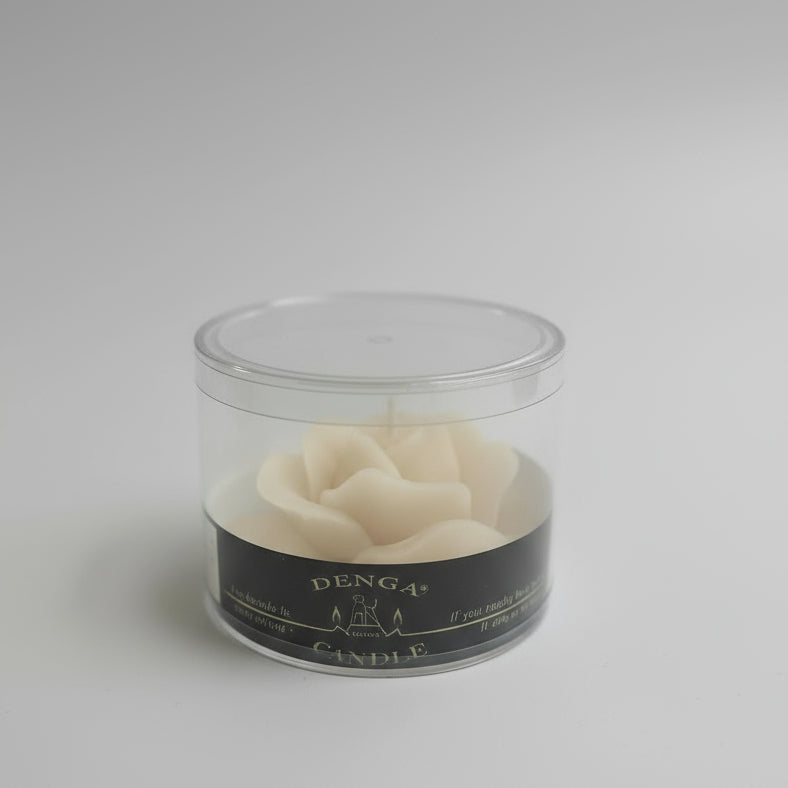 rose blossom candle in box sand