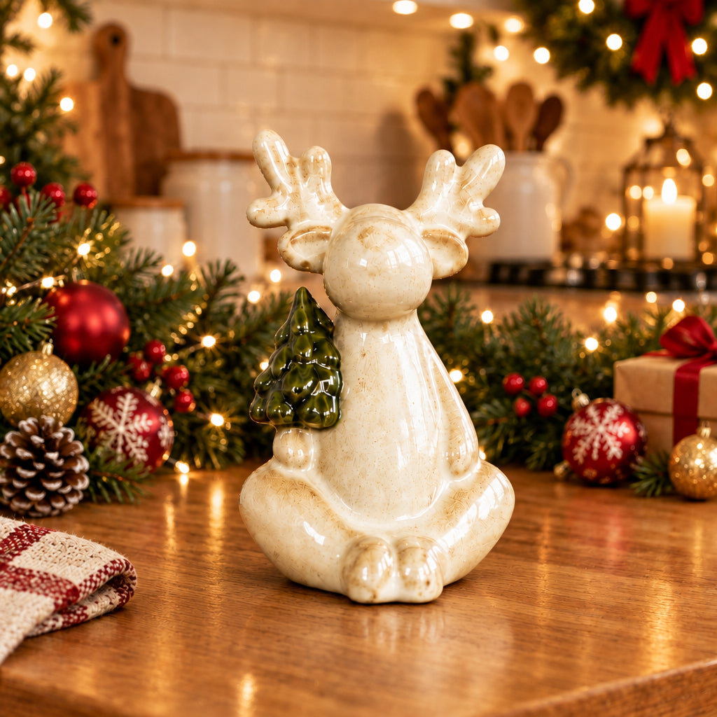 cream moose sitting on a round marble holder on a wooden table