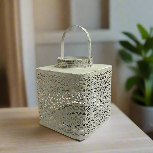 Decorative lantern with intricate cut-out patterns 