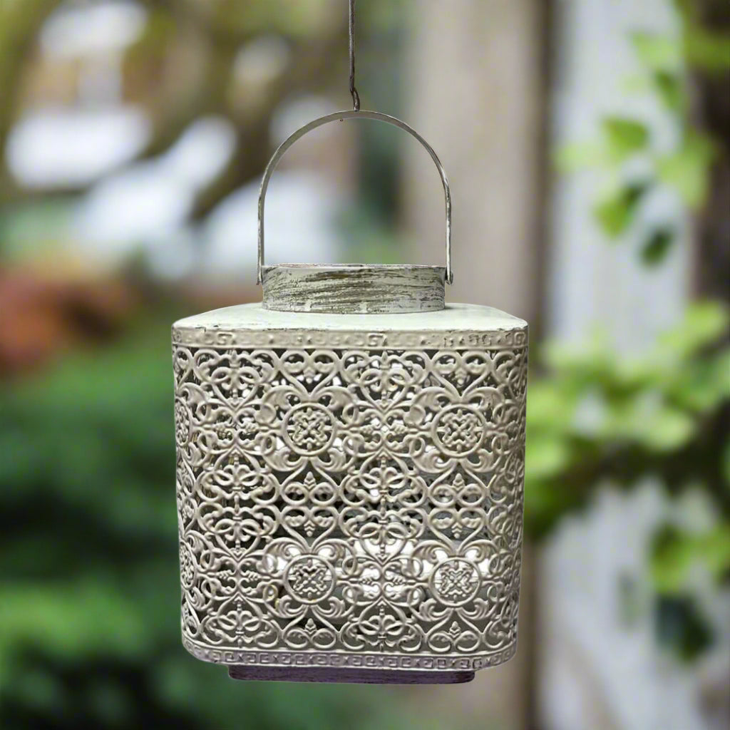 Decorative lantern with intricate patterns on a white background