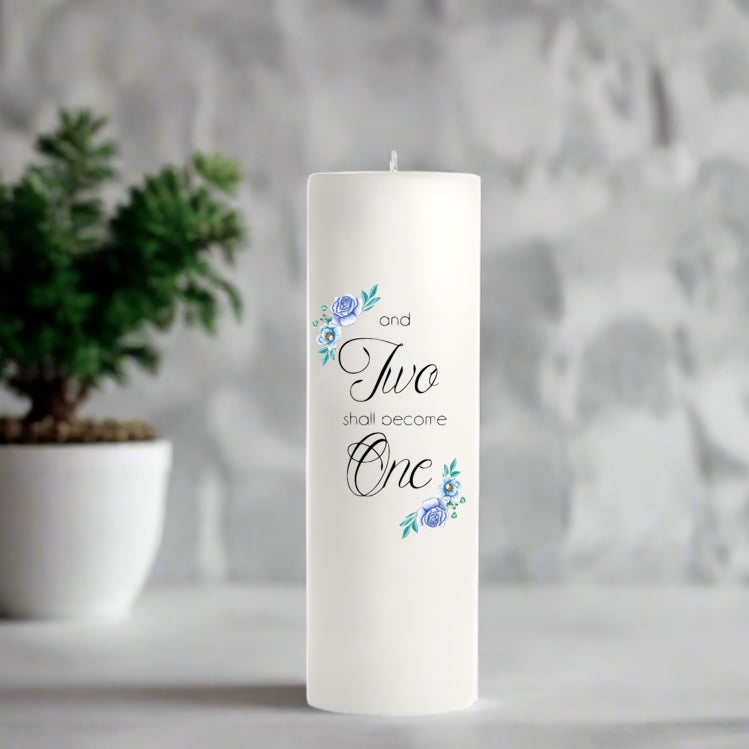 White wedding candle with decorative text and flowers