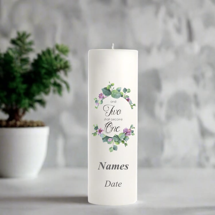 White wedding candle with floral design and text 