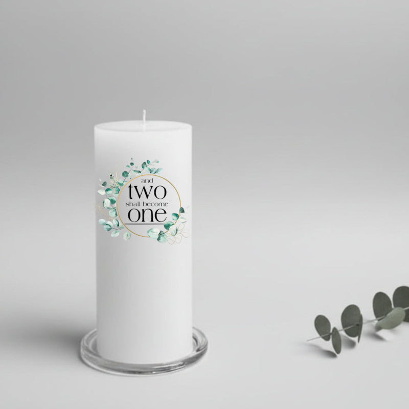 White wedding candle with decorative label on a gray background