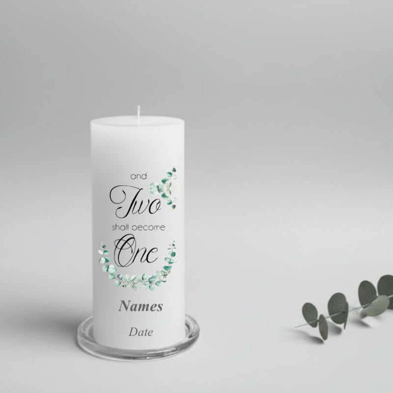 White wedding candle with decorative text and eucalyptus design