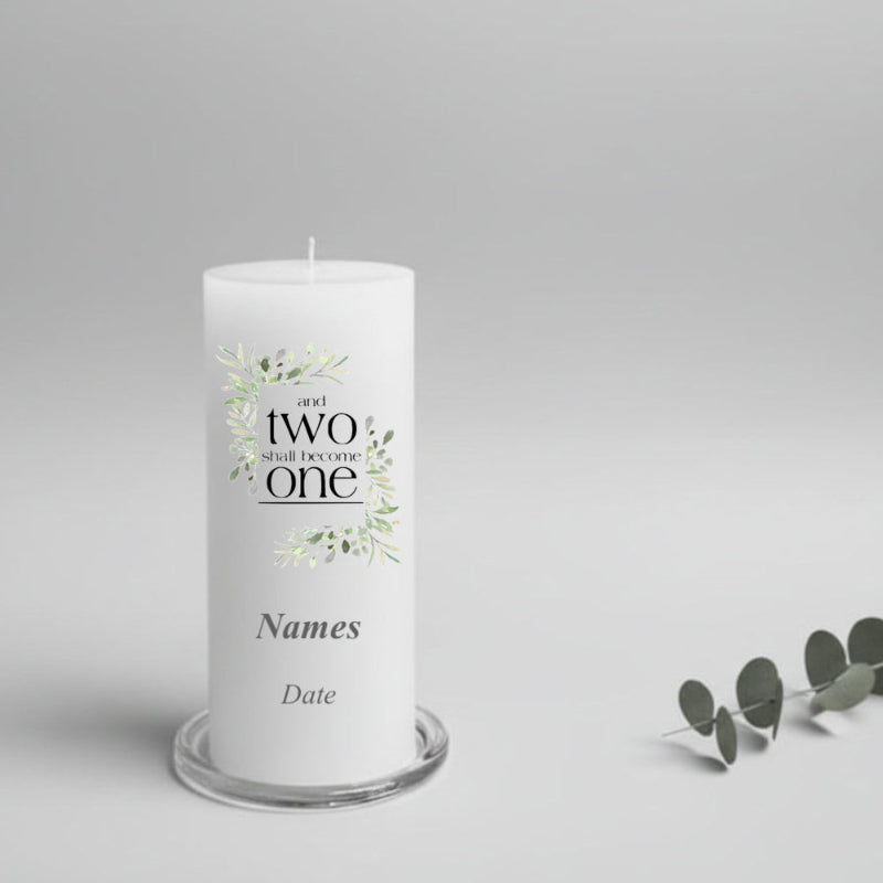 White wedding candle with text and floral design on a gray background