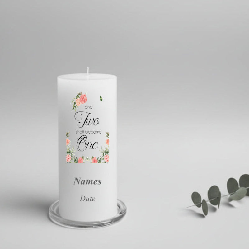 White wedding candle with floral design and text 