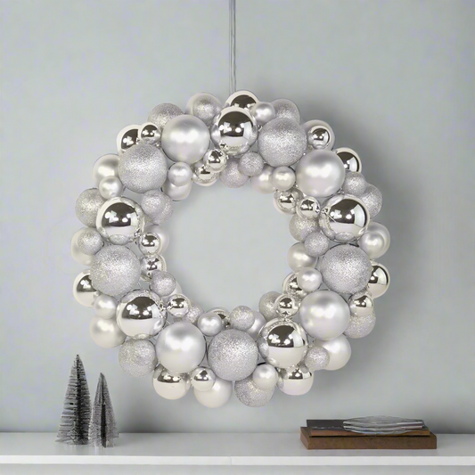 Decorative wreath made of silver and grey spherical ornaments
